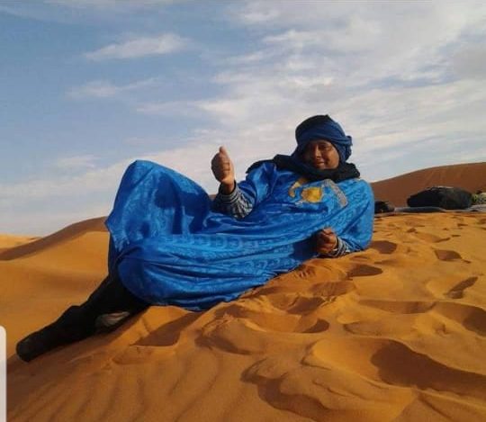 A relaxed moment in the Sahara dunes