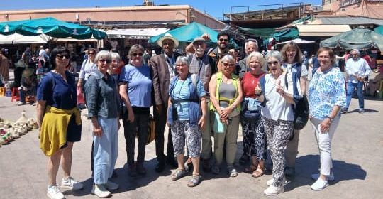 With travelers at the market square